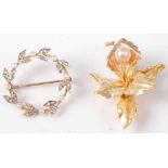 A modern 18ct gold and cultured pearl set leaf and flower brooch, 3.6g, 39mm; together with an