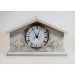 A 20th century marble cased mantel clock, the dial showing Roman numerals, the case of architectural