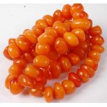 A beaded faux amber necklace, 240g, length 90cm