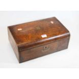 A Victorian burr walnut writing slope, the domed lid lifting to reveal a fitted interior, width