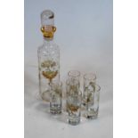 A 20th century continental glass cordial set, with gilt and floral decoration (7)