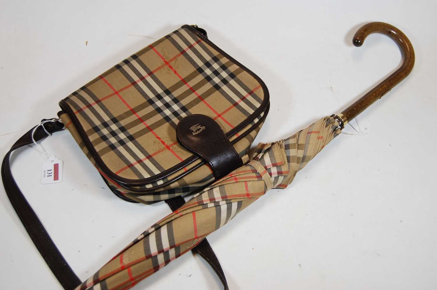 A Burberry? tartan handbag, together with a similar umbrella