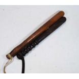 A 19th century police truncheon, together with another similar, 44cm
