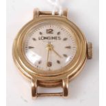 A lady's Longines 9ct gold wristwatch, having signed champagne dial, manual wind movement (lacks