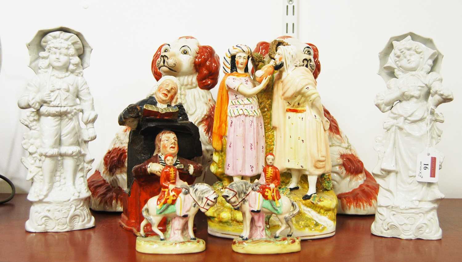 A collection of eight various 19th century and later figures, to include Staffordshire, tallest