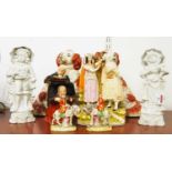 A collection of eight various 19th century and later figures, to include Staffordshire, tallest