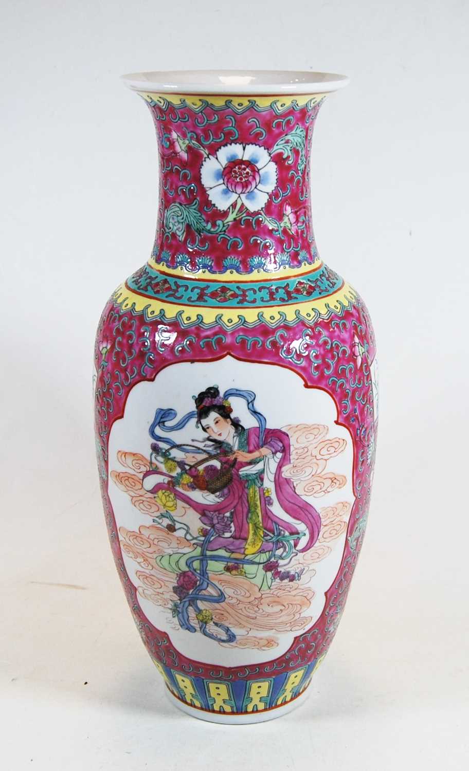 A 20th century Chinese porcelain famille rose vase of baluster form, decorated with figures within a