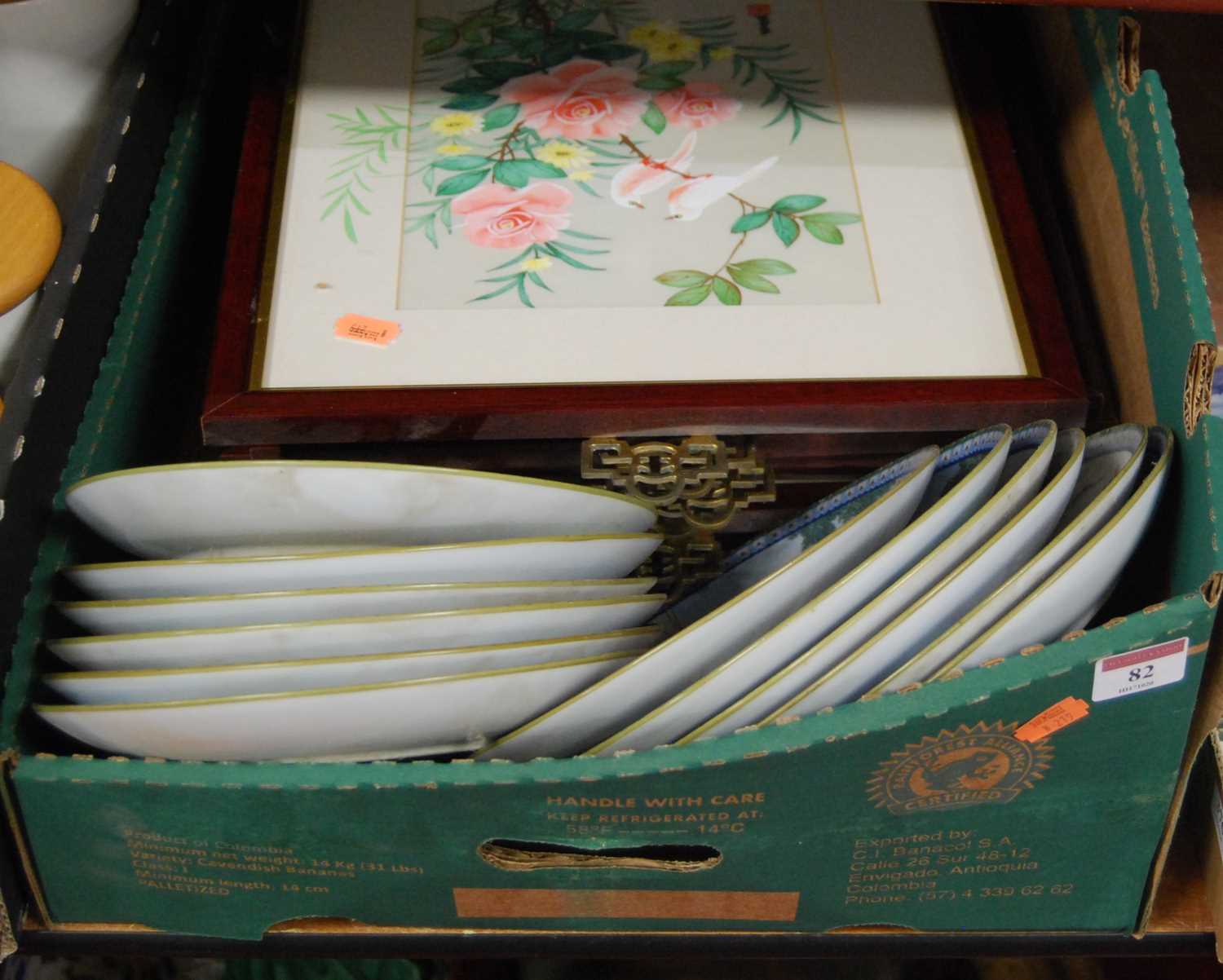 A box containing a collection of Chinese porcelain plates and Chinese silk paintings