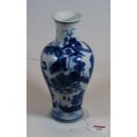 A Chinese export blue and white vase, of baluster form, decorated with various pagodas within a