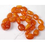 A beaded faux amber knotted necklace, 111g, length 74cm