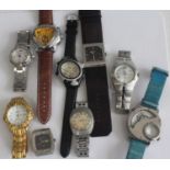 A collection of gents fashion watches to include Accurist, Ricardo, Base, and other examples,