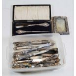 A box of miscellaneous silver and silver plate to include a circa 1900 silver handled shoe horn