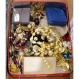 Assorted costume jewellery to include brooches, necklaces, ear clips etc