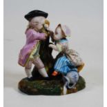 An early 20th century bisque porcelain figure group of young boy and girl, each in period costume