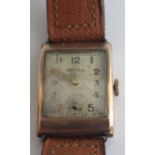 A Vintage gents Rotary 9ct gold cased tank watch having signed silver dial, subsidiary seconds dial,