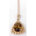 A modern 9ct gold and smoky topaz set pendant on finelink neck chain, 3.9g