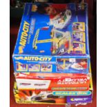 A Scalextric Bash 'n' Crash 1 boxed set; together with a Micro Scalextric Ultimate Velocity boxed