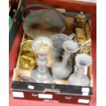 A box containing a collection of metal ware to include a pewter candlestick and a tankard