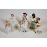 A collection of six Royal Doulton porcelain figures of children to include Faithful Friend,