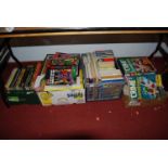 Four boxes of assorted childrens and teenage interest volumes, to include comics, annuals, Crime