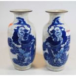 A pair of 20th century Chinese blue & white crackle glazed vases, with flared rims, the ovoid body