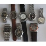 A collection of gents steel cased fashion watches to include three examples by Pulsar, one by