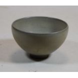 A Chinese celadon type bowl, of tapered circular form, dia.12cm
