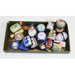 A collection of assorted mainly modern enamelled pill boxes, to include novelty examples