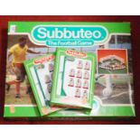 A boxed Subbuteo Club edition table football game, together with two boxed Subbuteo table soccer
