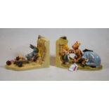 A pair of Royal Doulton porcelain Winnie the Pooh collection bookends, "Push ...Pull! Come on Pooh!"