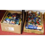 Four boxes containing a collection of various diecast model vehicles to include Hot Wheels and