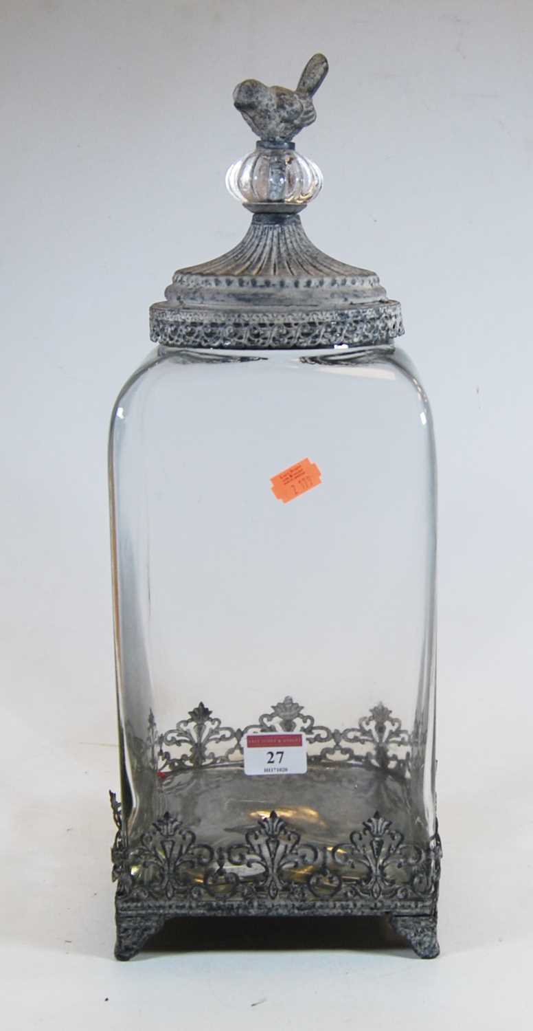 A modern glass and galvanised metal mounted jar, the lid with bird finial, height 45cm