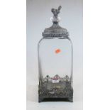 A modern glass and galvanised metal mounted jar, the lid with bird finial, height 45cm
