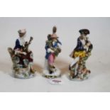 A pair of late 19th century continental porcelain figures, being male and female musicians, each