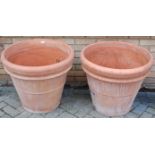 A pair of good quality large contemporary terracotta circular planters, of tapering form, by The