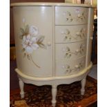 A contemporary floral painted demi-lune double door side cupboard, having four central drawers, w.
