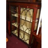 An Edwardian mahogany and further strung double door glazed china display cabinet, w.118cm