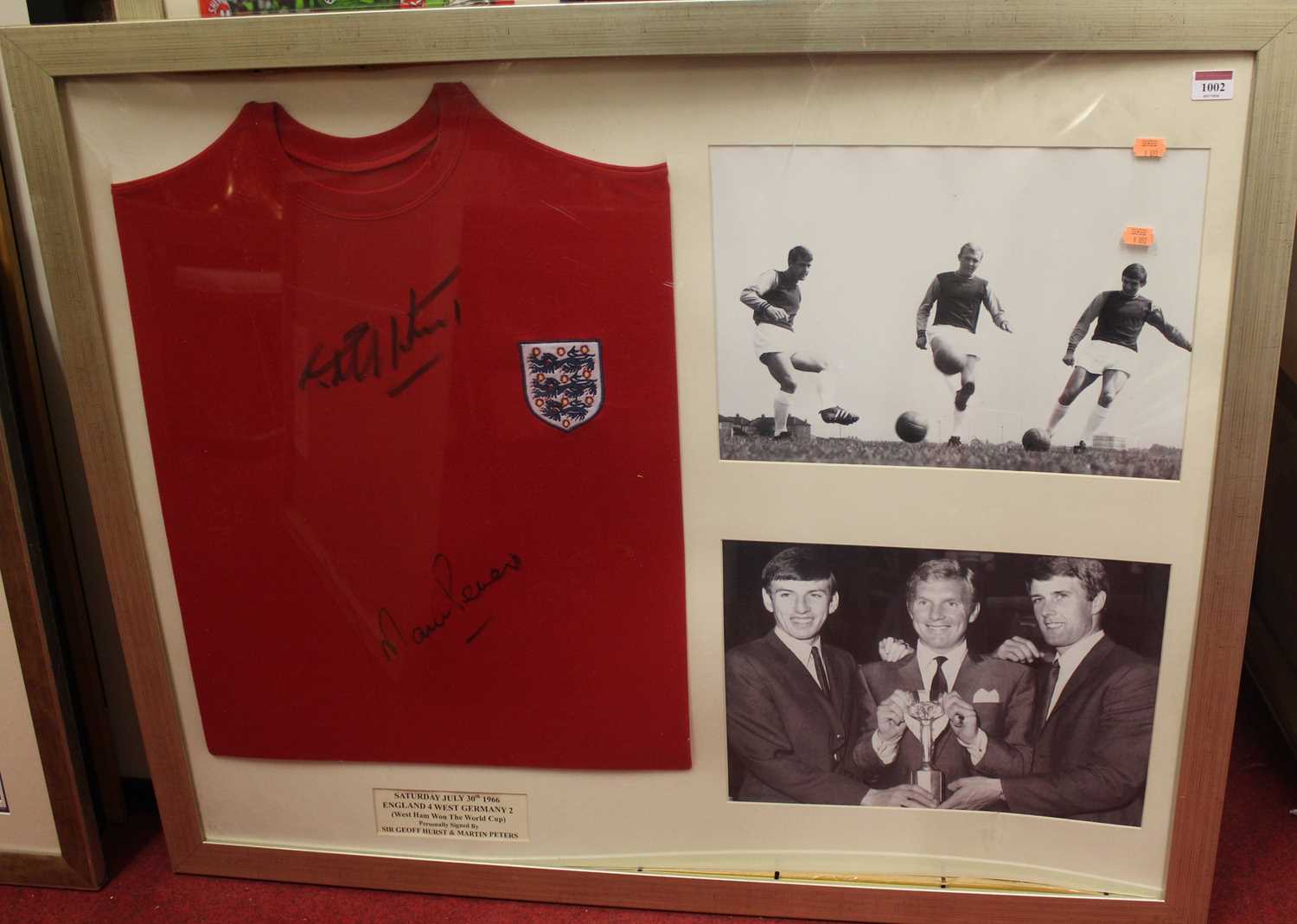 England 1966 World Cup interest - England replica shirt signed by Sir Geoff Hurst and Martin Peters,