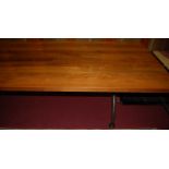 A large good quality contemporary figured walnut one piece long refectory dining table, raised on
