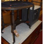 A late Victorian Aesthetic Movement ebonised oval low occasional table, w.76cm; together with a