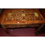 A French transistional style floral inlaid and gilt metal mounted fold-over games table, raised on