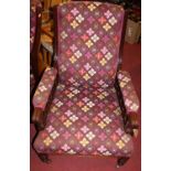 A pair of late Victorian mahogany framed and later bright coloured floral re-upholstered lady's