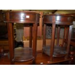 A pair of contemporary hardwood circular single drawer two-tier lamp tables, dia.50cm