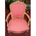 A circa 1900 French carved and faded walnut framed fauteuil, in the Louis XV style, w.60cm; together