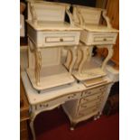 A cream painted and gilt decorated French style single pedestal kneehole dressing table, w.98cm;