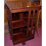 A stained hardwood square revolving eight division bookcase, w.51cm