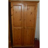 A modern pine double door childs wardrobe, w.97cm