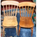 Six similar early 20th century elm seat and beech stick back kitchen chairs, together with a near