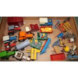 One box containing a quantity of Britains farm vehicles, trailers and implements, to include