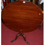 A 19th century oak circular tilt-top pedestal tripod table, dia.85cm